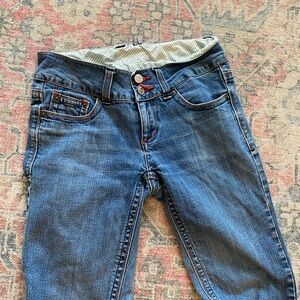 cutest low rise y2k dark wash jeans with red accent stitching ❤️